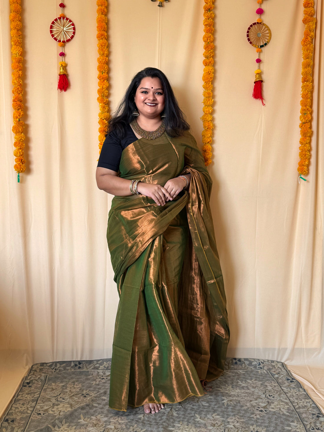 Rangdhaaga mehendi green with copper dual tone raga tissue saree