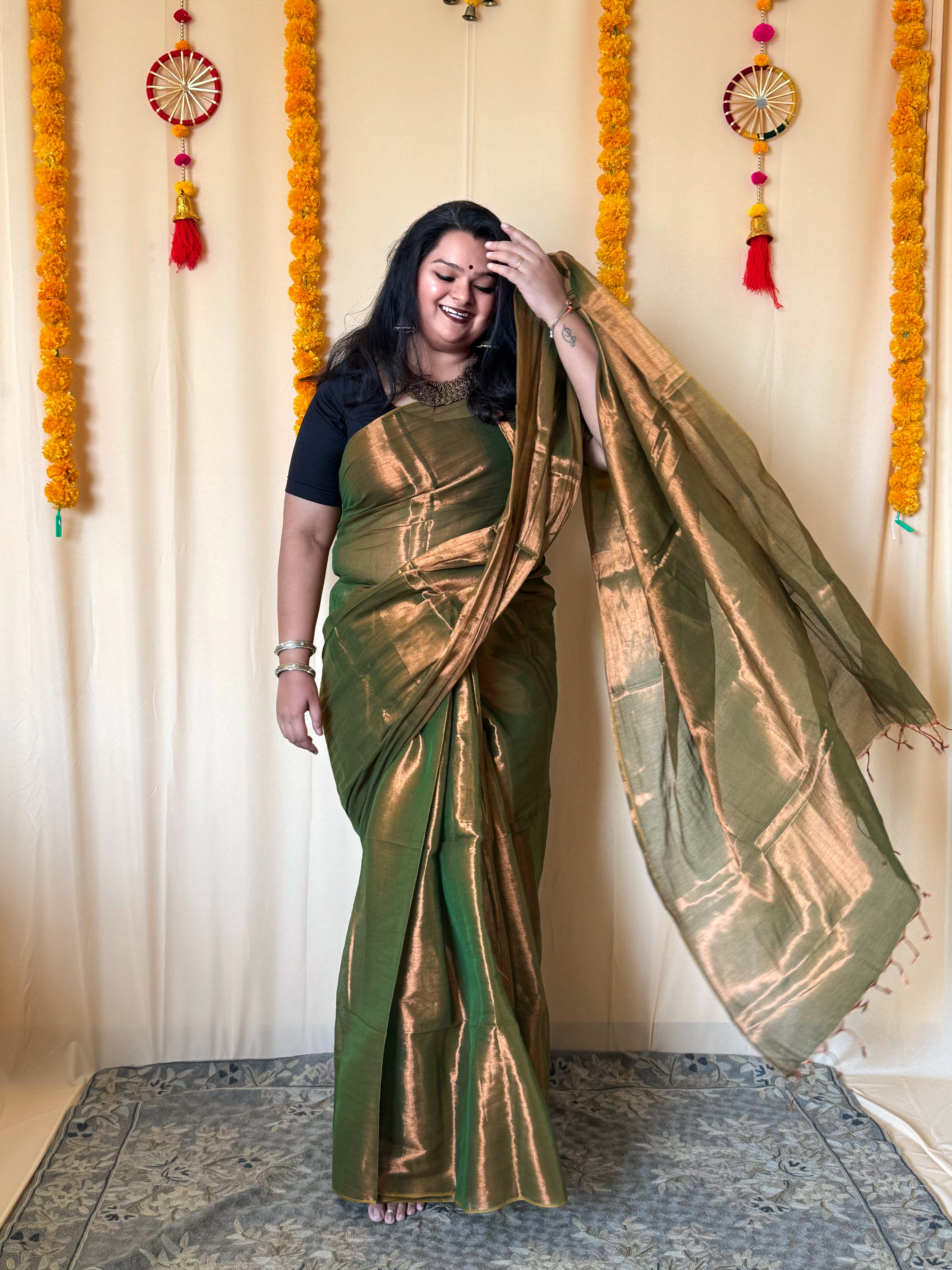 Rangdhaaga mehendi green with copper dual tone raga tissue saree