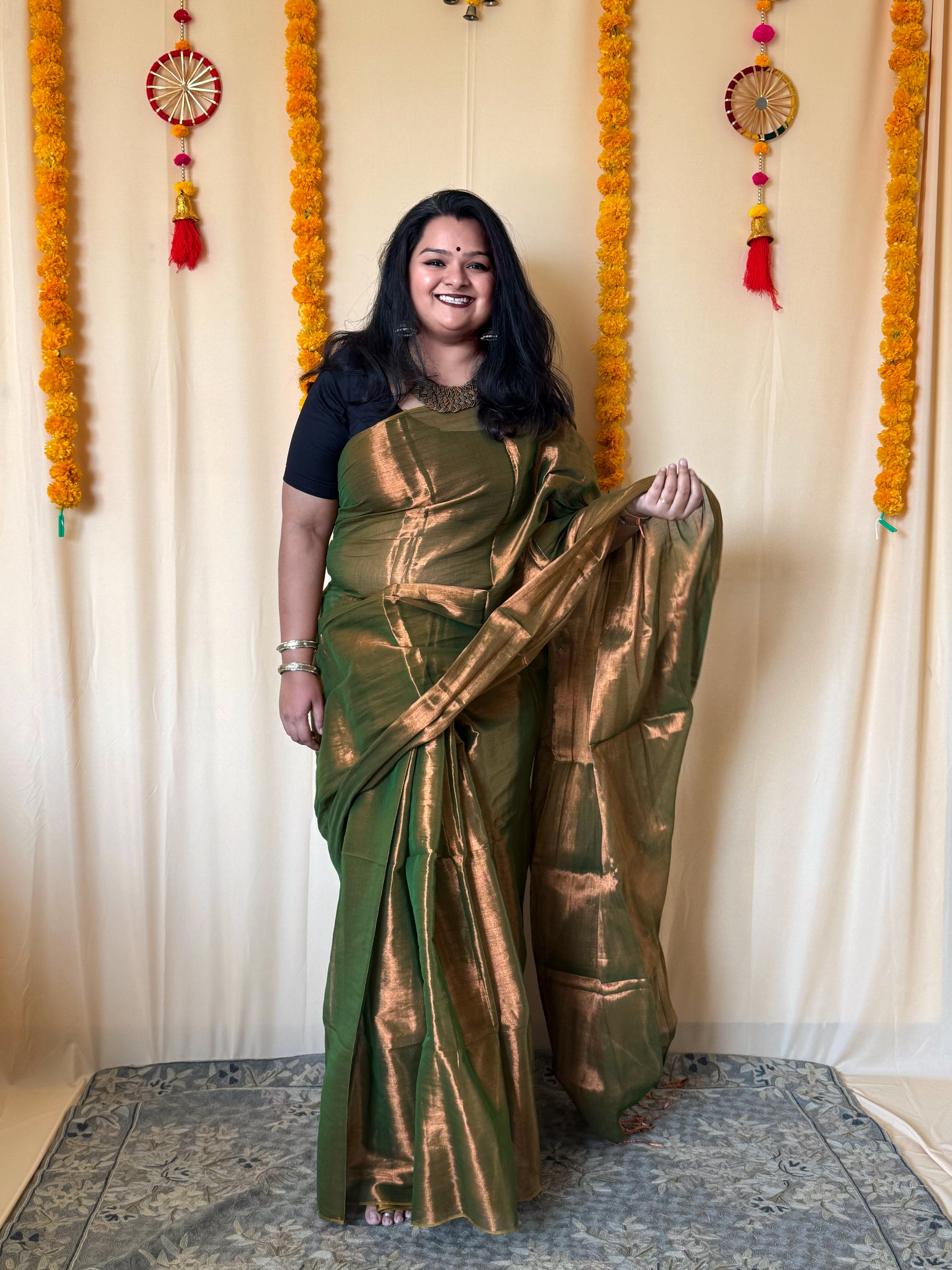 Rangdhaaga mehendi green with copper dual tone raga tissue saree