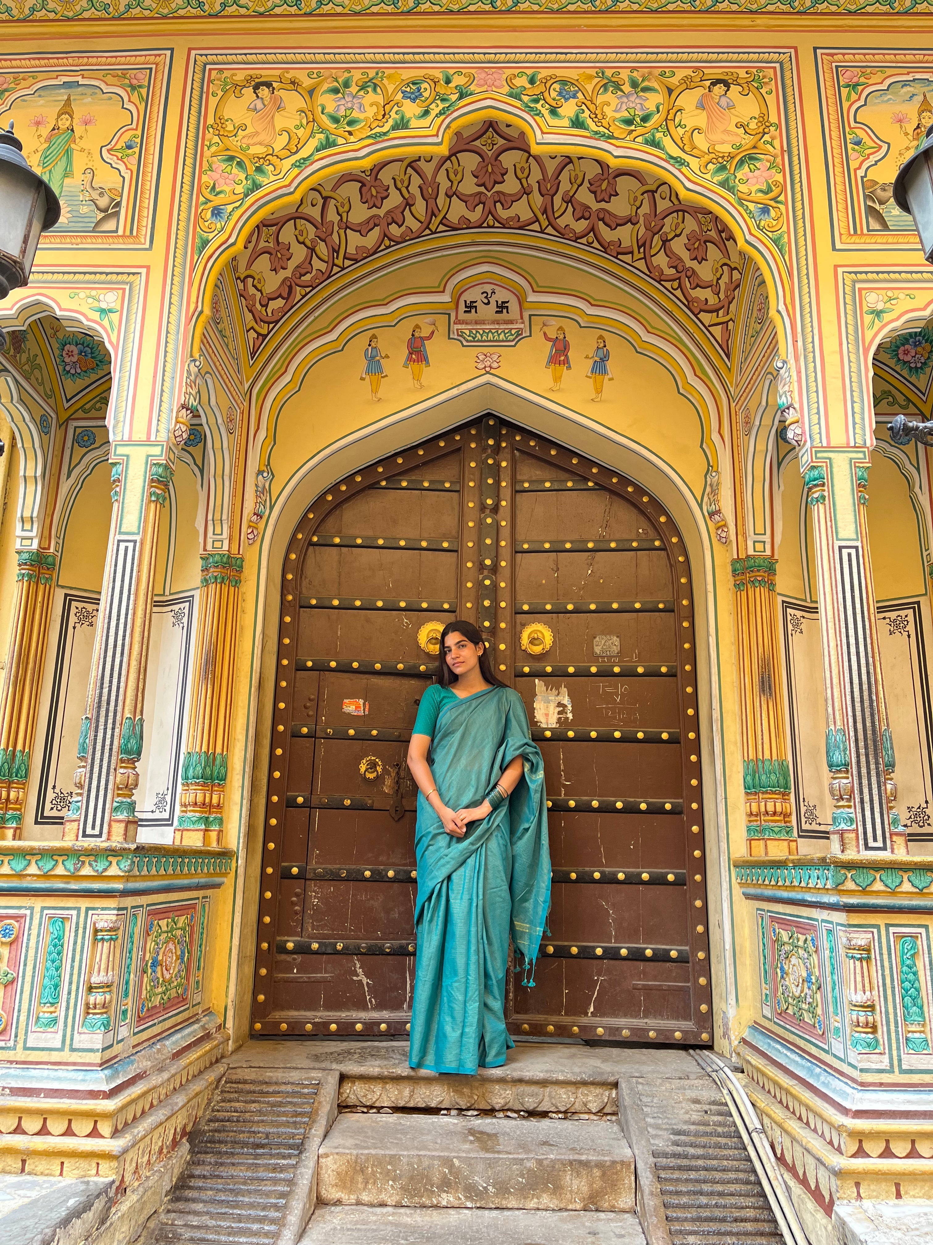 Rangdhaaga peacock green mini zari lining cotton saree