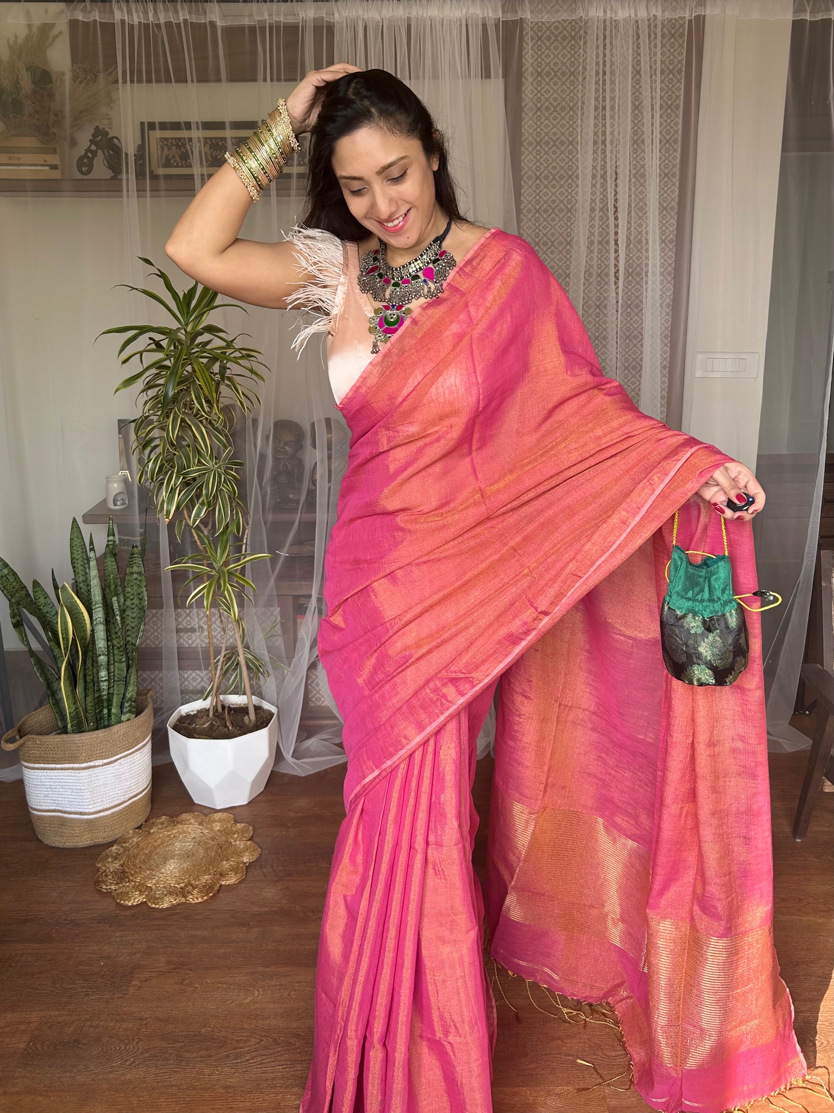 Rangdhaaga pink With golden dual tone tissue Linen Saree