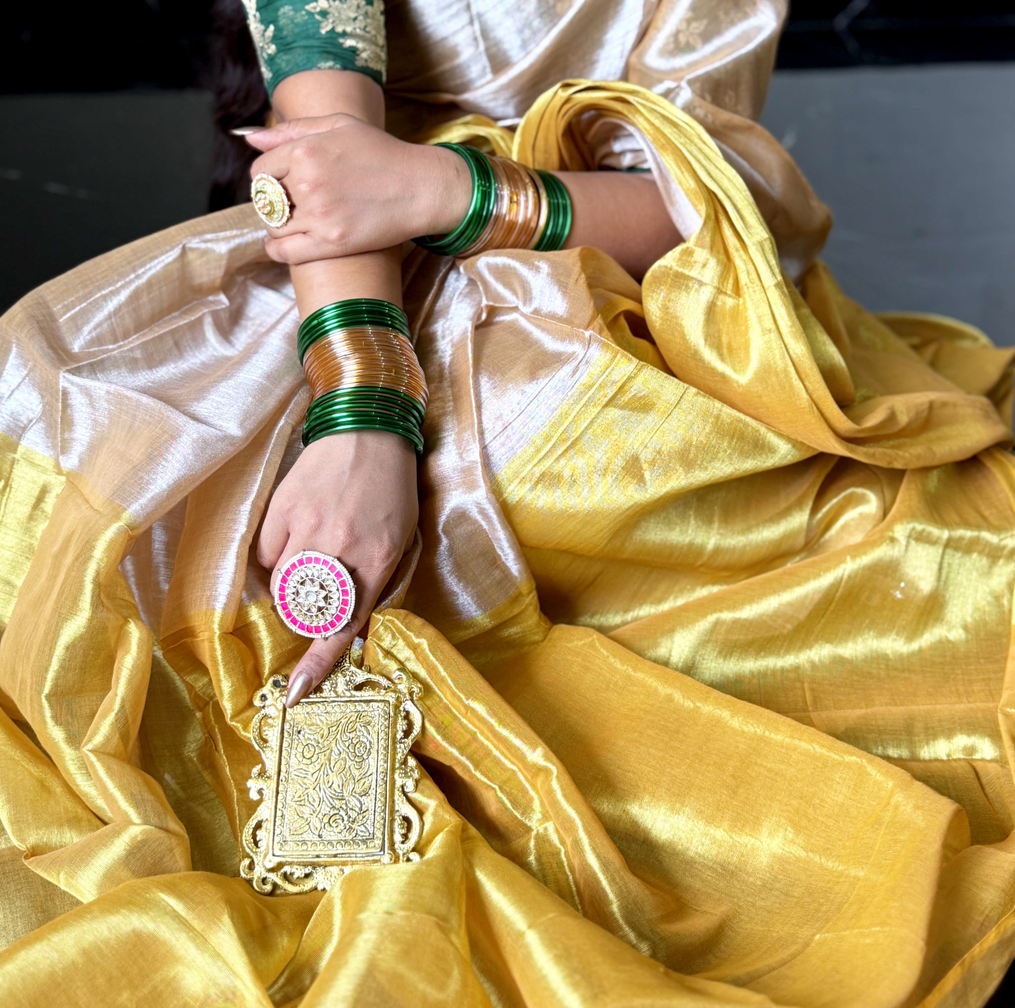 RangDhaaga Beige golden Raga Tissue Saree by Vanshika