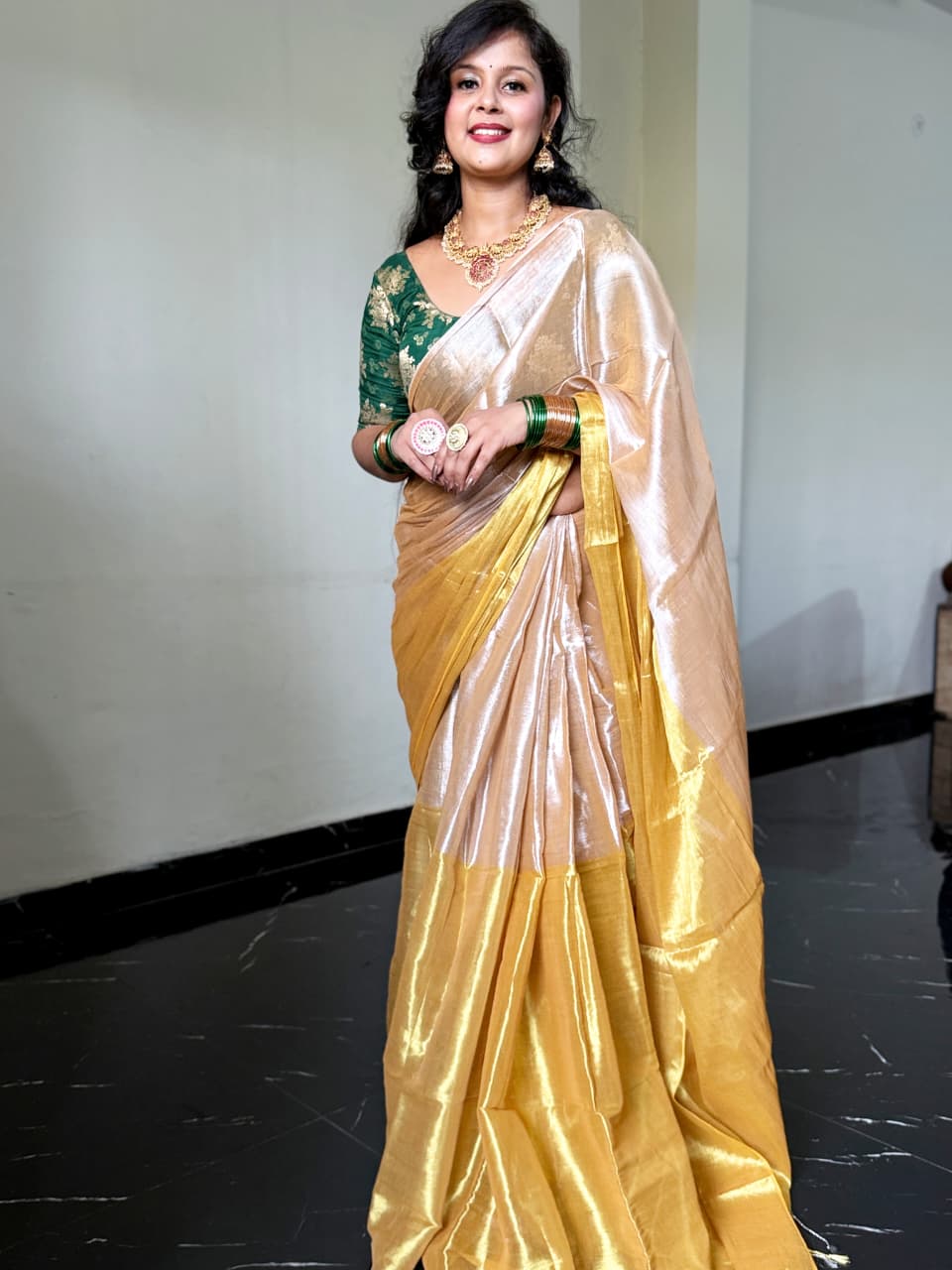 RangDhaaga Beige golden Raga Tissue Saree by Vanshika