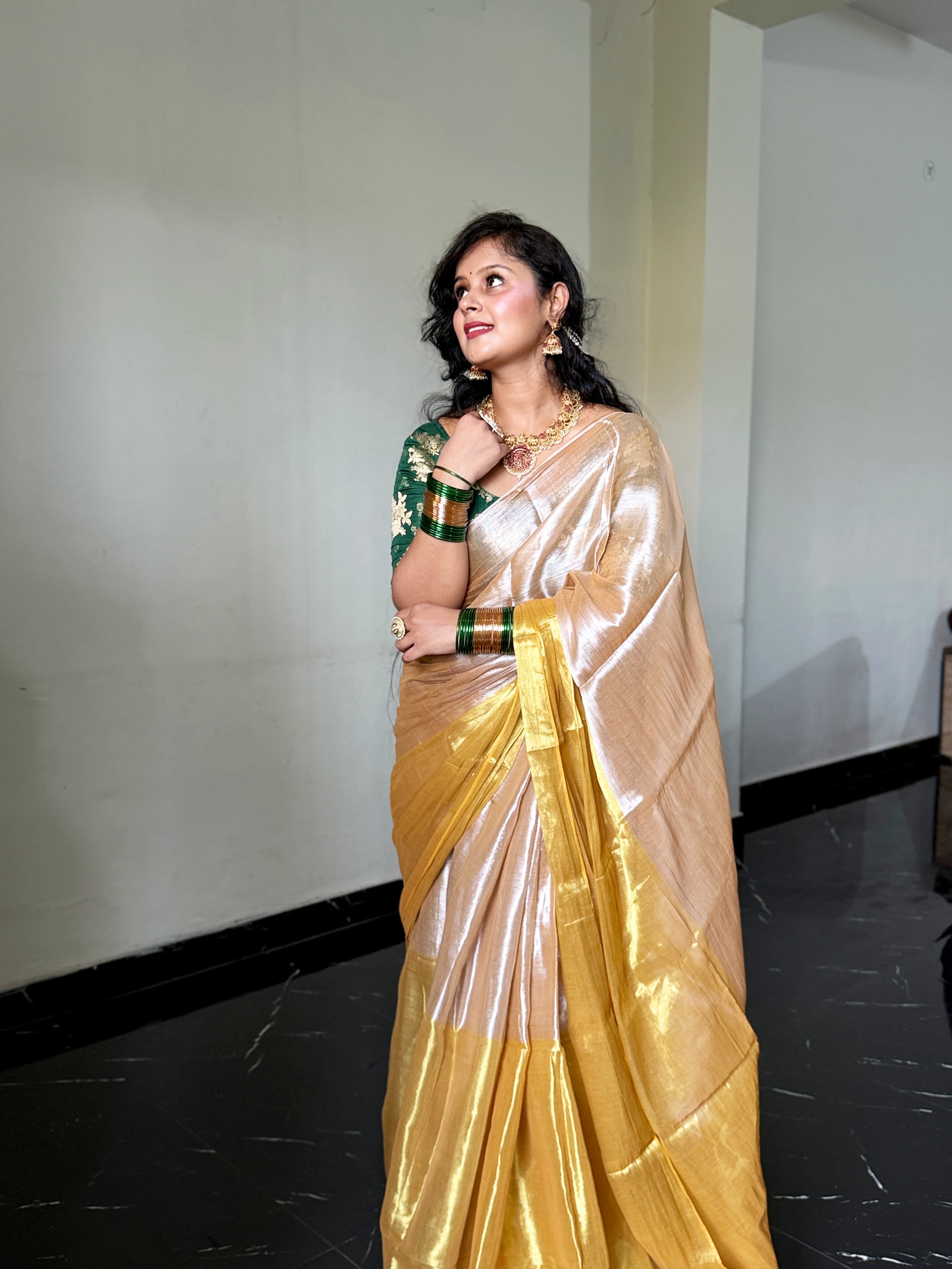 RangDhaaga Beige golden Raga Tissue Saree by Vanshika